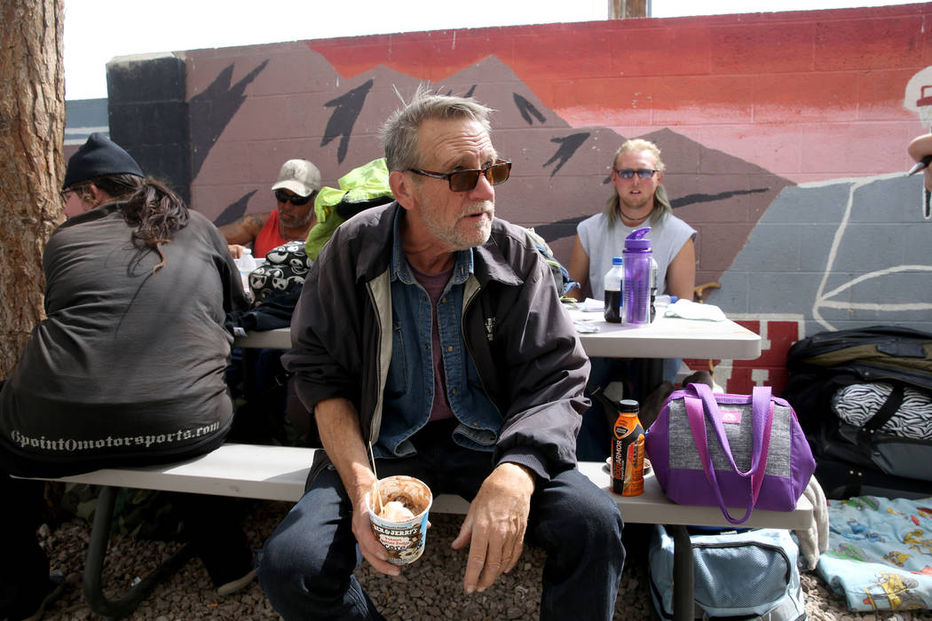 Mike Brennan, 66, talks to a reporter at the City of Las Vegas Courtyard Homeless Resource Cent ...