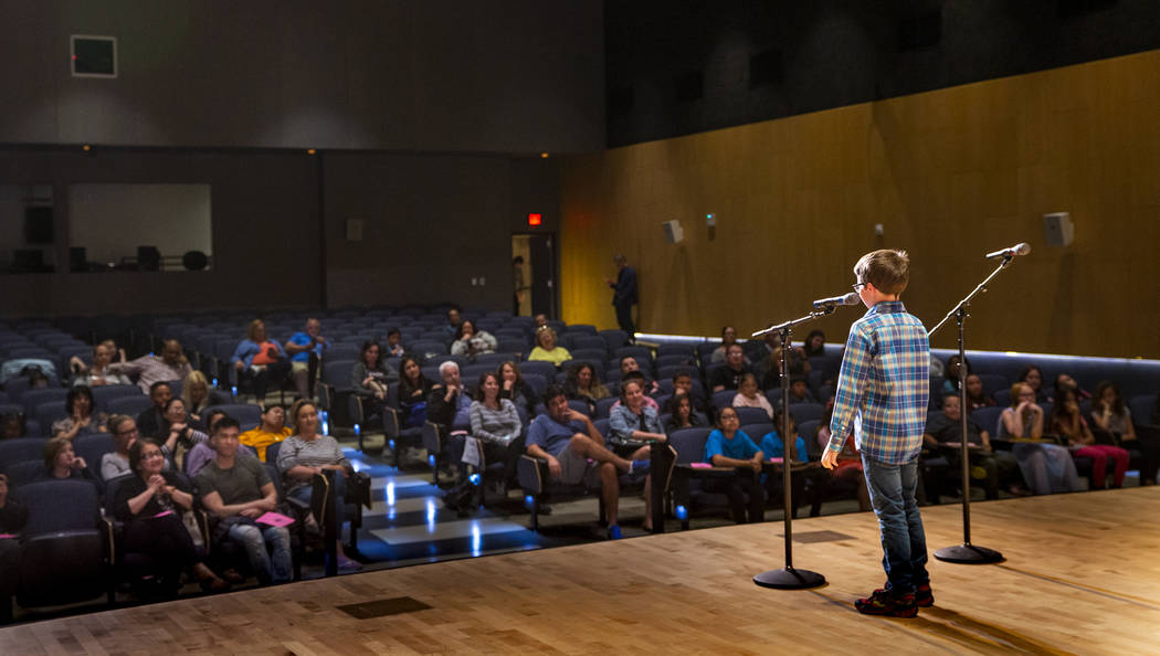 Forbuss Elementary School student Reed Hambly performs "Purple, Green and Yellow" dur ...