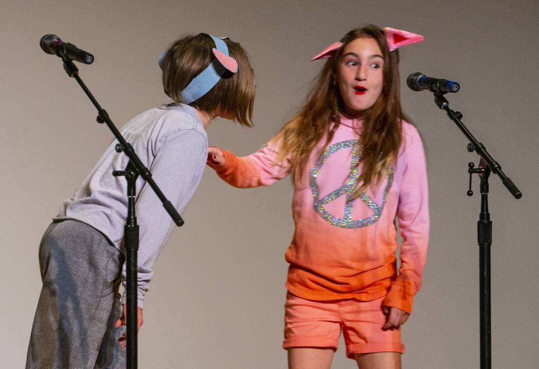 Goolsby Elementary School students Magnolia Johnson and Gianna Pellicone perform "I Am a F ...