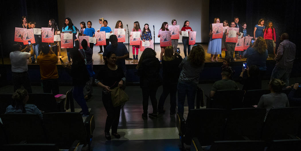 CCSD elementary school students gather on stage after reciting their stories during the Bristle ...