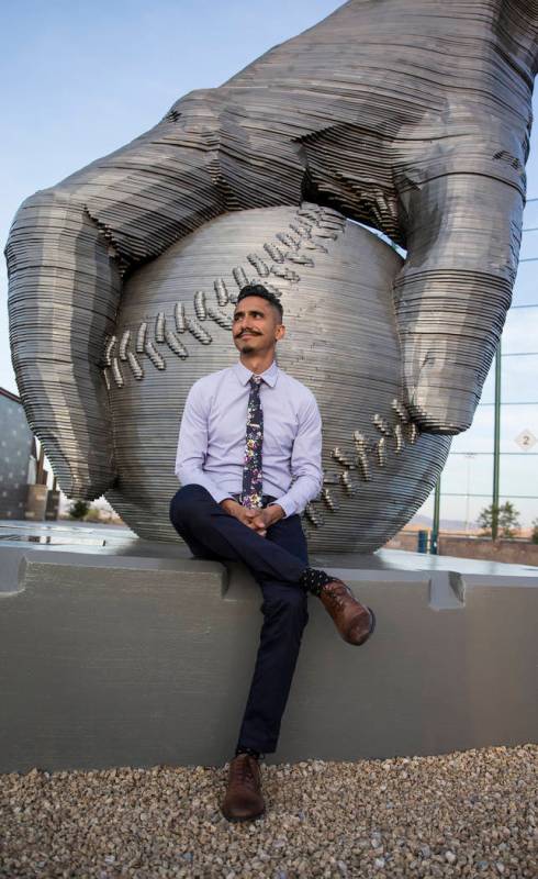 Artist Luis Varela-Rico with his sculpture "Organic Study No. 2" during a dedication ...