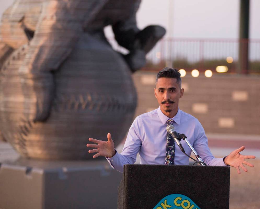 Artist Luis Varela-Rico speaks during a dedication ceremony for his sculpture "Organic Stu ...