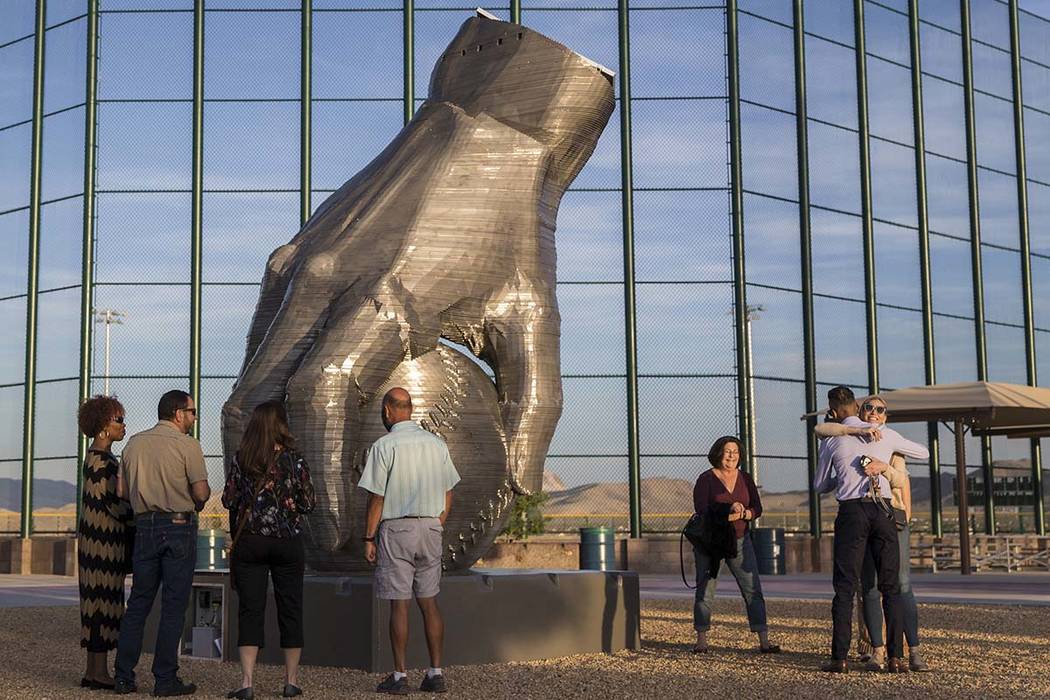 People view artist Luis Varela-Rico's sculpture "Organic Study No. 2" during a dedica ...