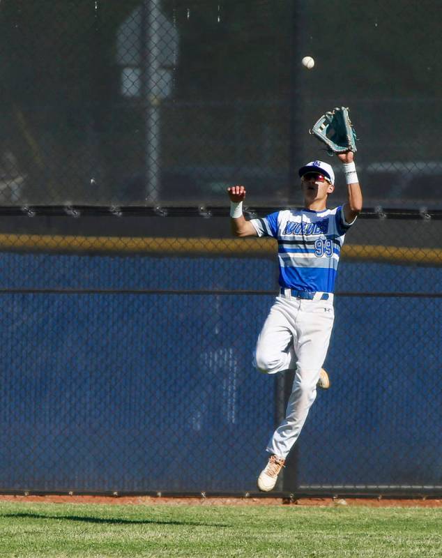 Basic first baseman John Howard Bobo (99) jumps up to catch a ball in the fourth inning of a ba ...