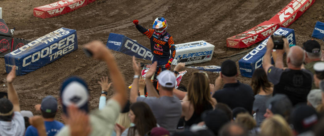 Red plate points leader Cooper Webb (2) greets the fans before the featured 450 SX class race a ...