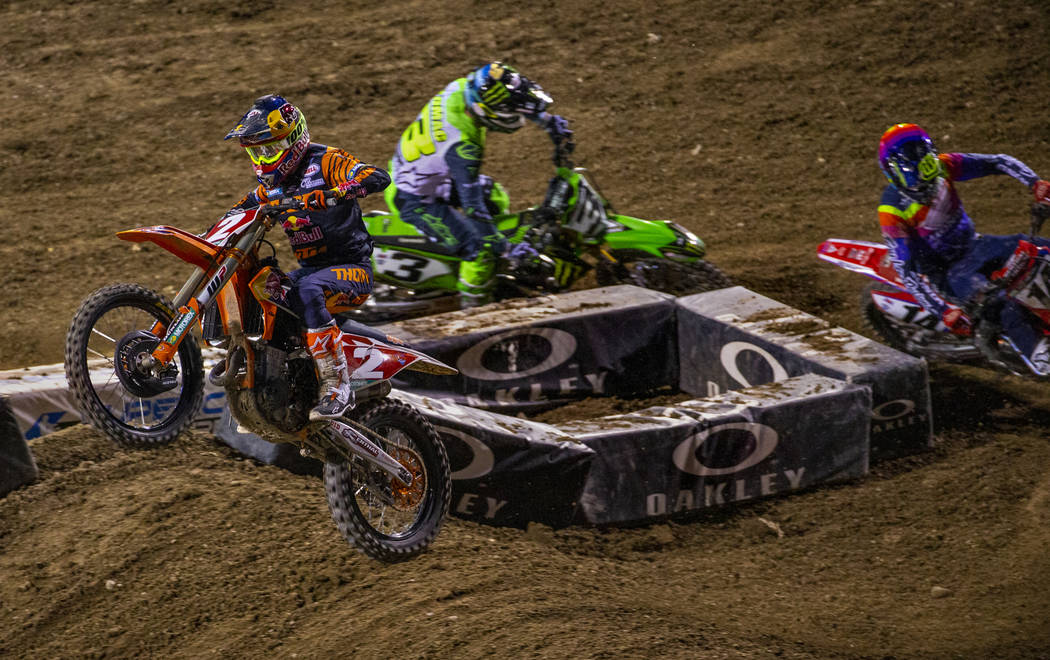 Red plate points leader Cooper Webb (2) leads the pack during the featured 450 SX class race at ...
