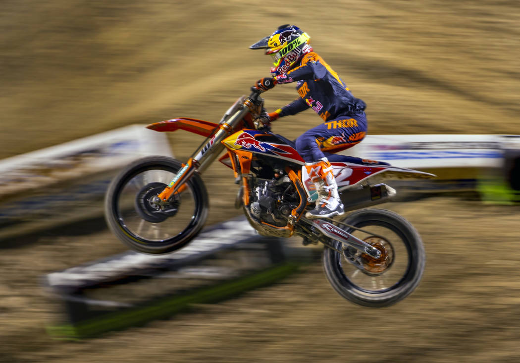 Red plate points leader Cooper Webb (2) leads the pack during the featured 450 SX class race at ...