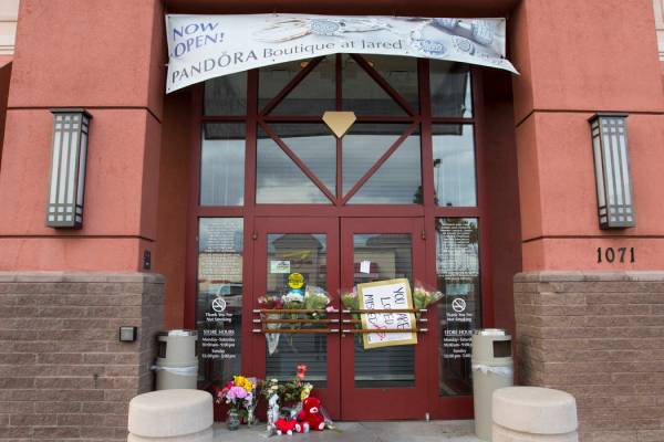 A memorial display in front of Jared, a jewelry store where employee Kimberlee Ann Kincaid-Hill ...