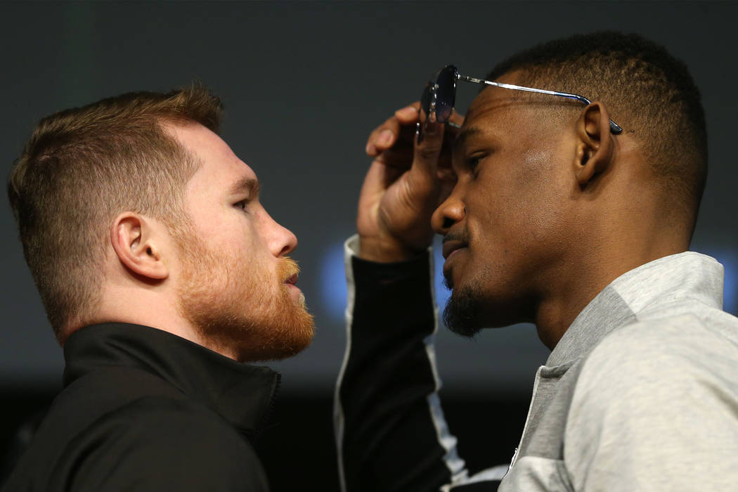 Saul "Canelo" Alvarez, left, and Daniel Jacobs, pose during a press conference at the ...