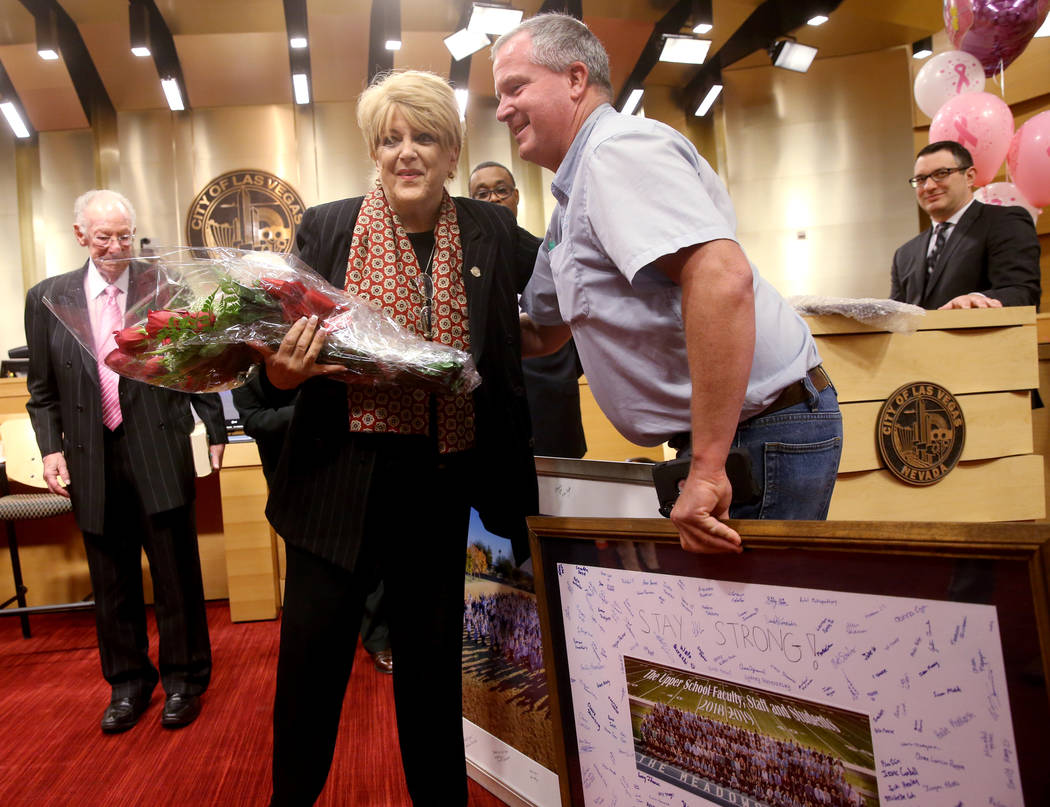 Las Vegas Mayor Carolyn Goodman hugs Bret Peterson, director of facilities at The Meadows Schoo ...
