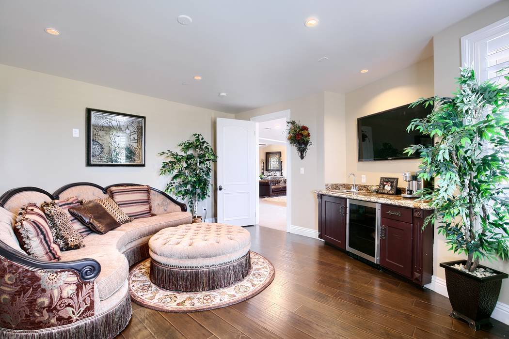 The master suite has a sitting area and kitchenette. (Signature Real Estate Group)