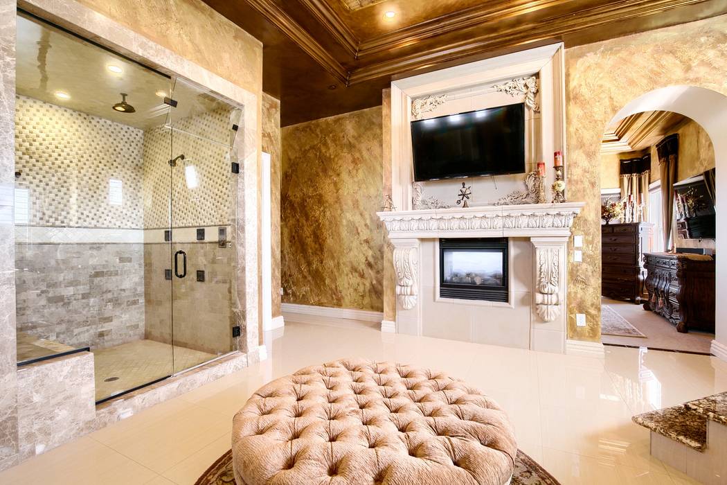 The master bath features a fireplace. (Signature Real Estate Group)