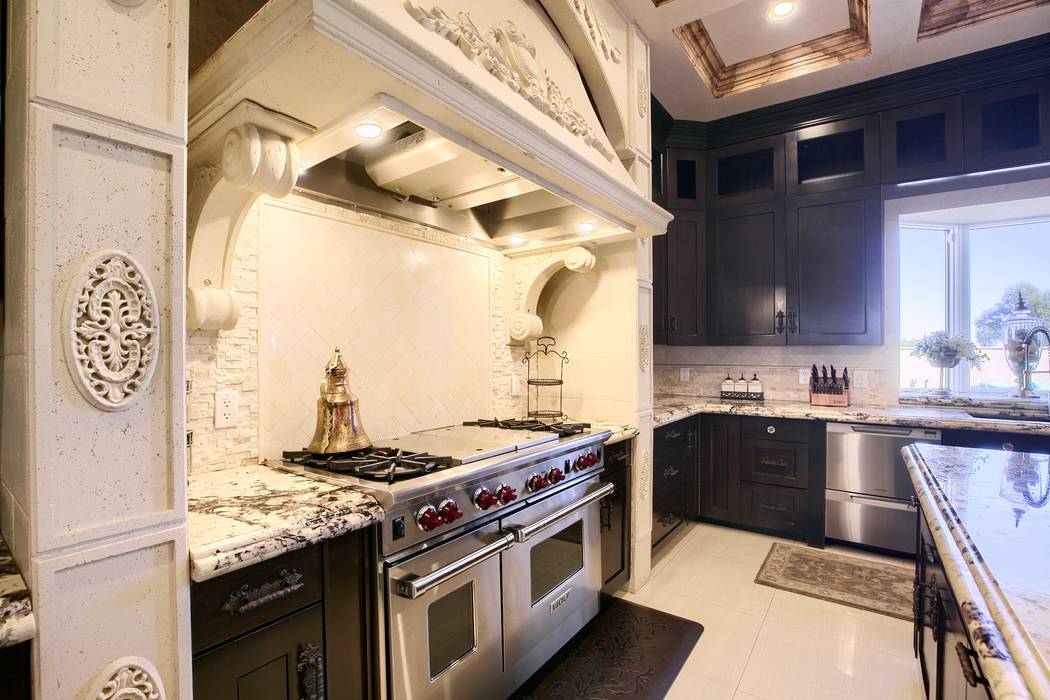 The kitchen is equipped with upgraded appliances. (Signature Real Estate Group)