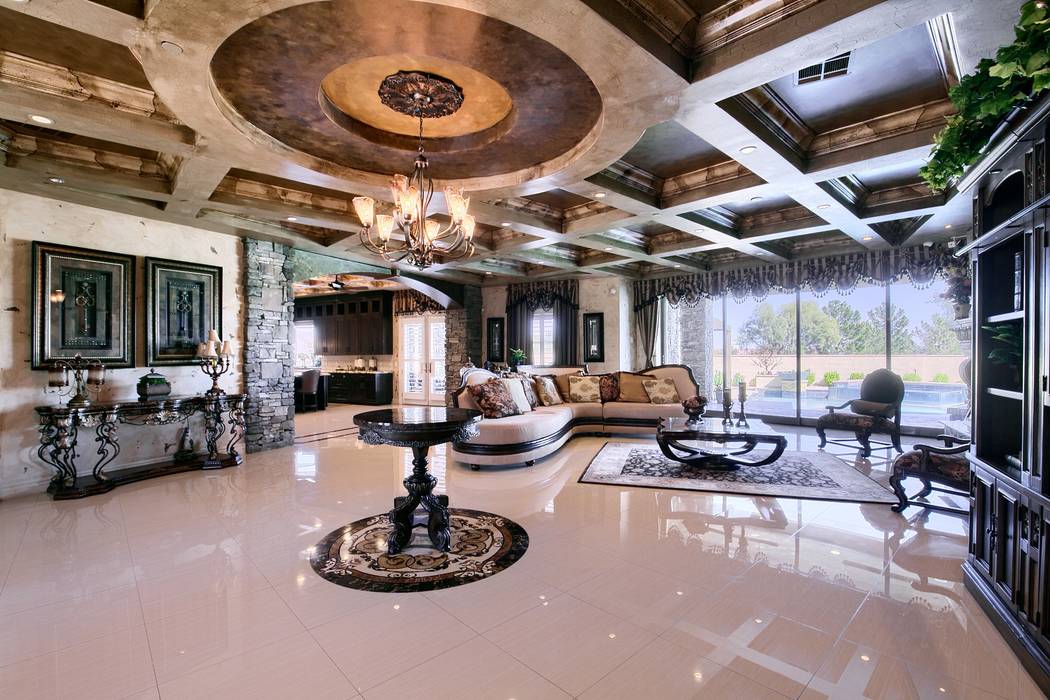 The living room has a traditional style. (Signature Real Estate Group)