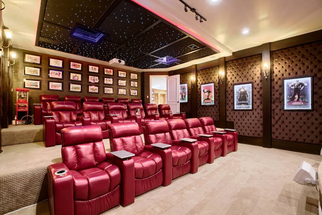 The basement houses a large home move theater. (Signature Real Estate Group)