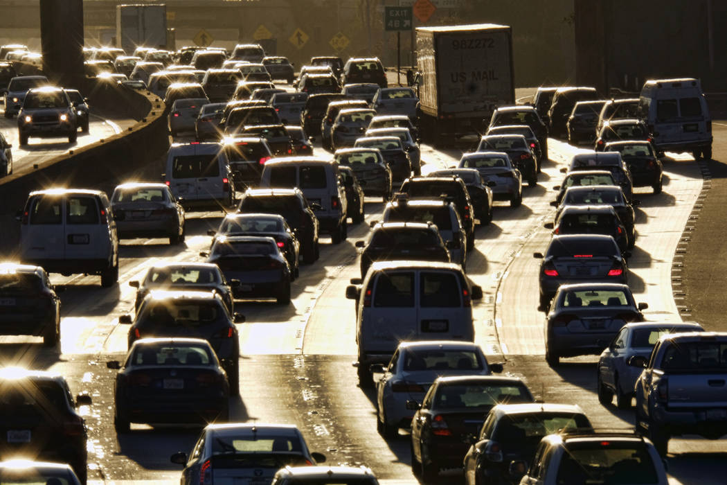 In this Nov. 15, 2016, file photo morning rush hour traffic moves along the southbound lanes al ...