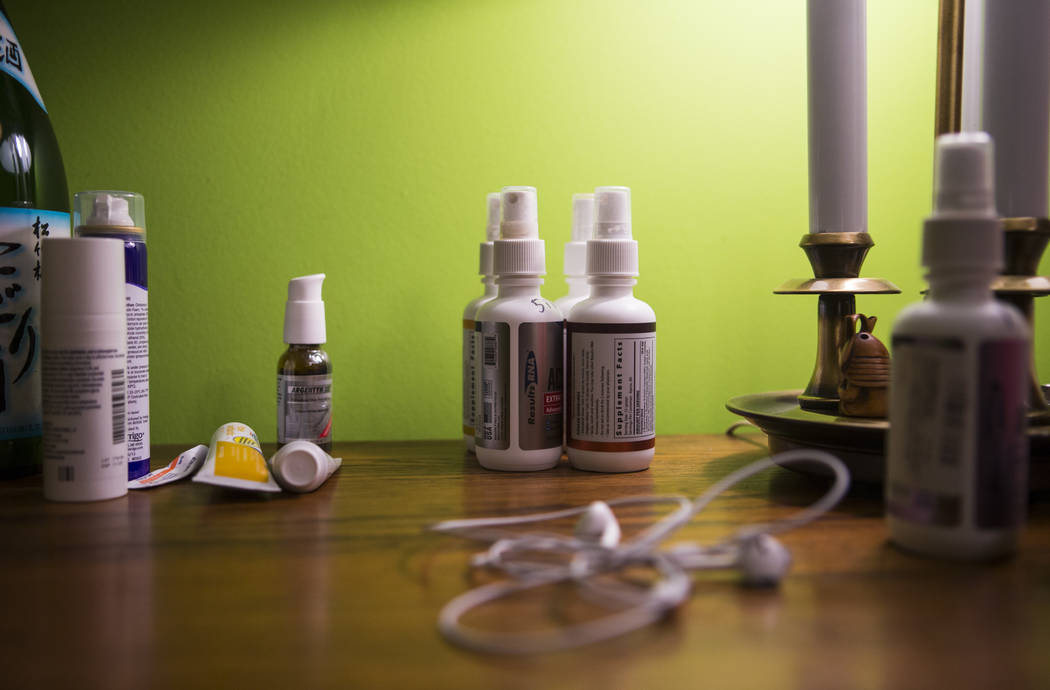 Medication on the bedside table of Grayson McClure at his home in Collierville, Tenn., on Thurs ...