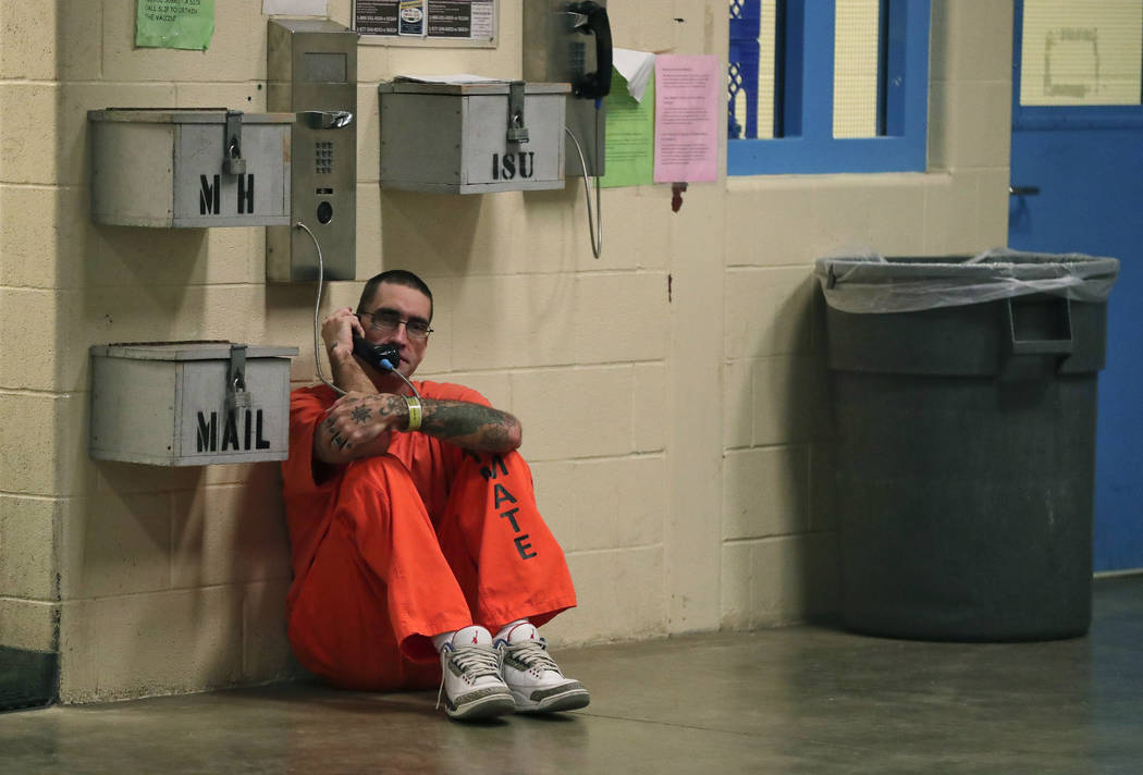 In this Nov. 27, 2017 file photo, inmate Lance Shaver talks on the phone at the Albany County C ...