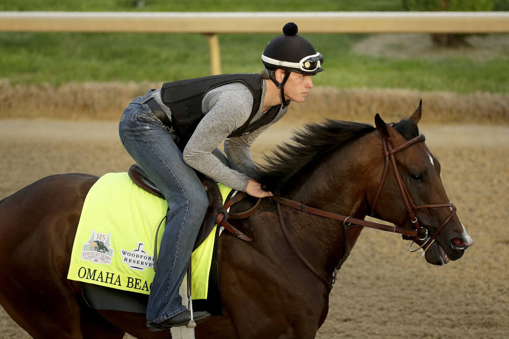 Exercise rider Taylor Cambra rides Kentucky Derby entrant Omaha Beach during a workout at Churc ...