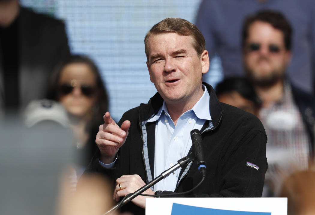 U.S. Senator Michael Bennet, D-Colo., speaks Oct. 24, 2018, before Senator Bernie Sanders durin ...