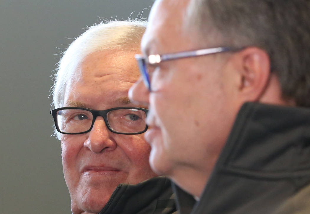 Golden Knights owner Bill Foley, left, listens as Kelly McCrimmon, the new general manager, spe ...