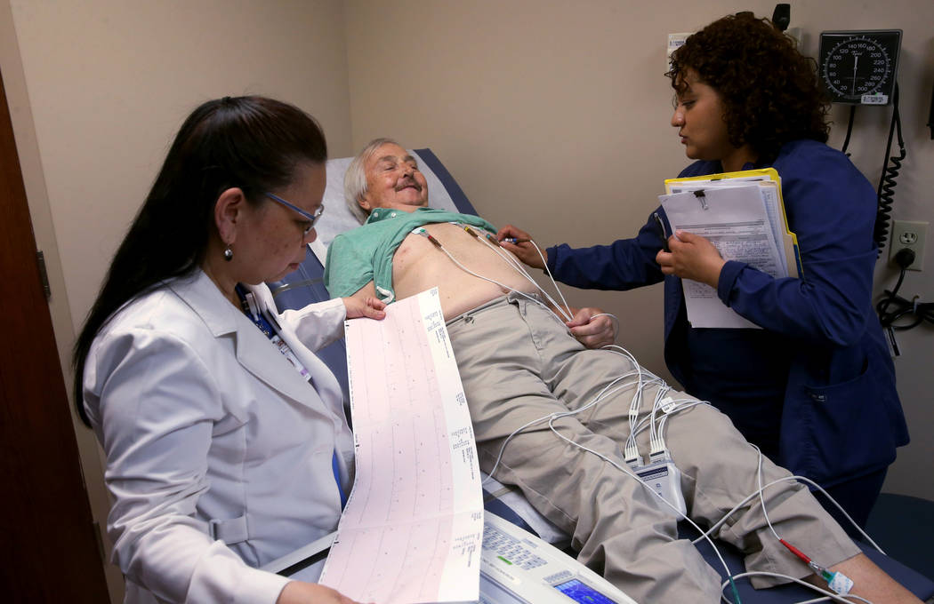 AnaArlene Ramirez, a phase 1 research supervisor, left, and Elizabeth Hutchings, a phase 1 rese ...