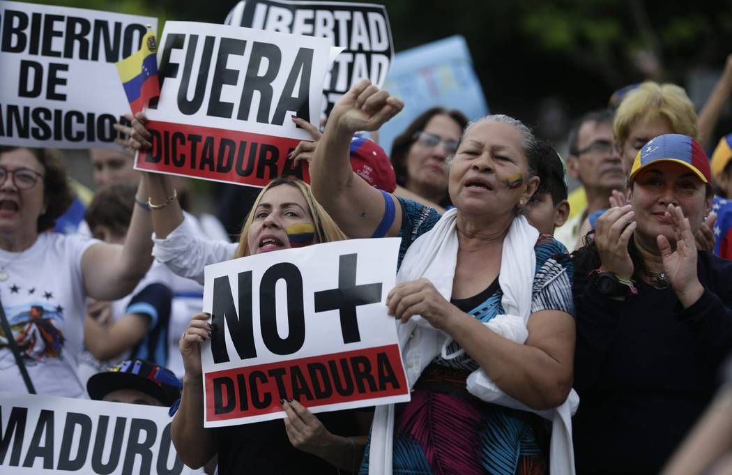 Supporters of Venezuela’s opposition leader and self proclaimed President Juan Guaid&#xf ...