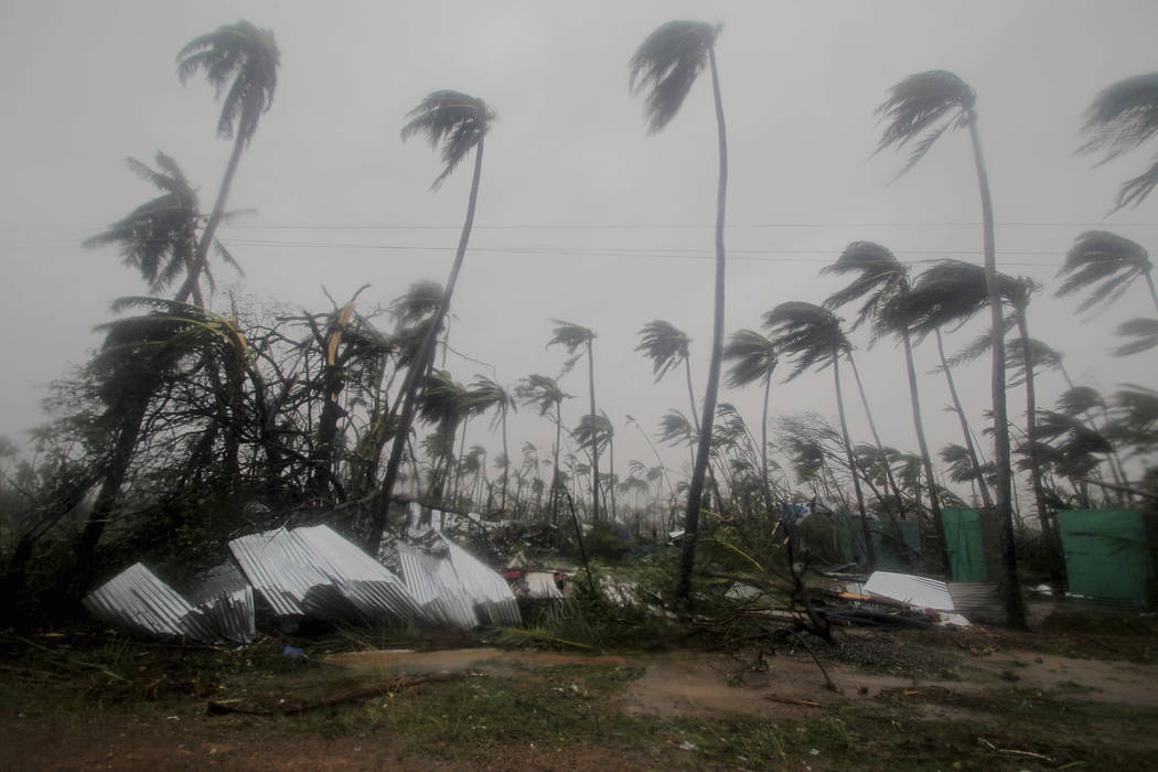 Damaged structures and tress are seen amid gusty winds in Puri district after Cyclone Fani hit ...