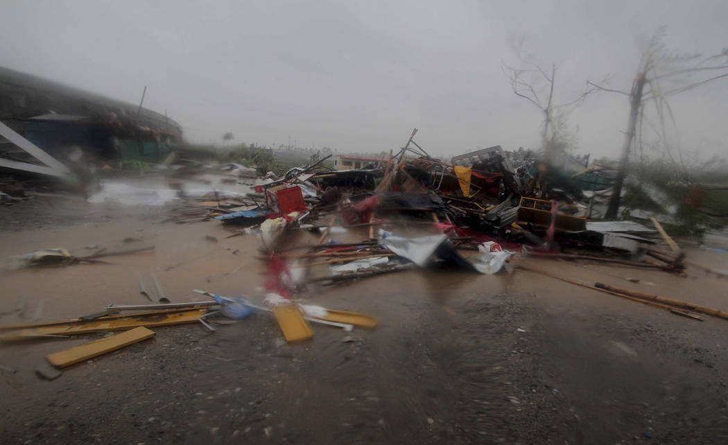 A road is littered with fallen structures in Puri district after Cyclone Fani hit the coastal e ...