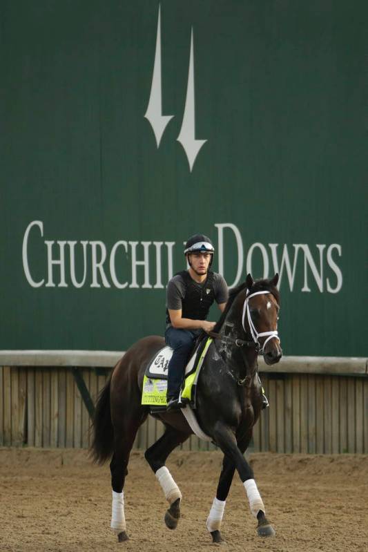 Kentucky Derby entrant Cutting Humor walks on the track during a workout at Churchill Downs, Th ...