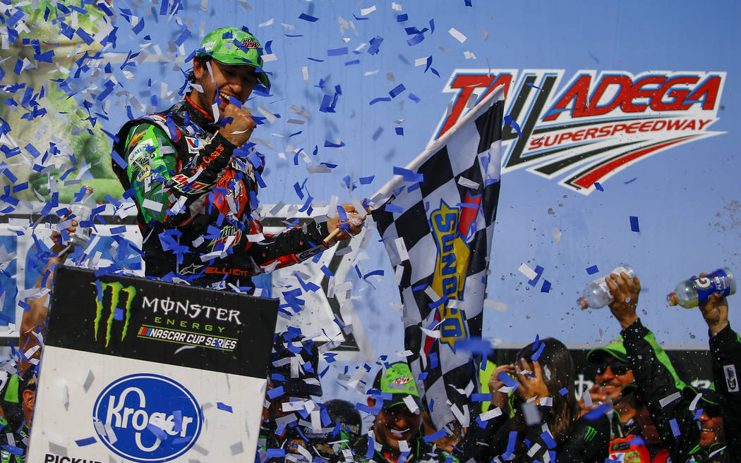 Chase Elliott, left, celebrates after winning a NASCAR Cup Series auto race at Talladega Supers ...