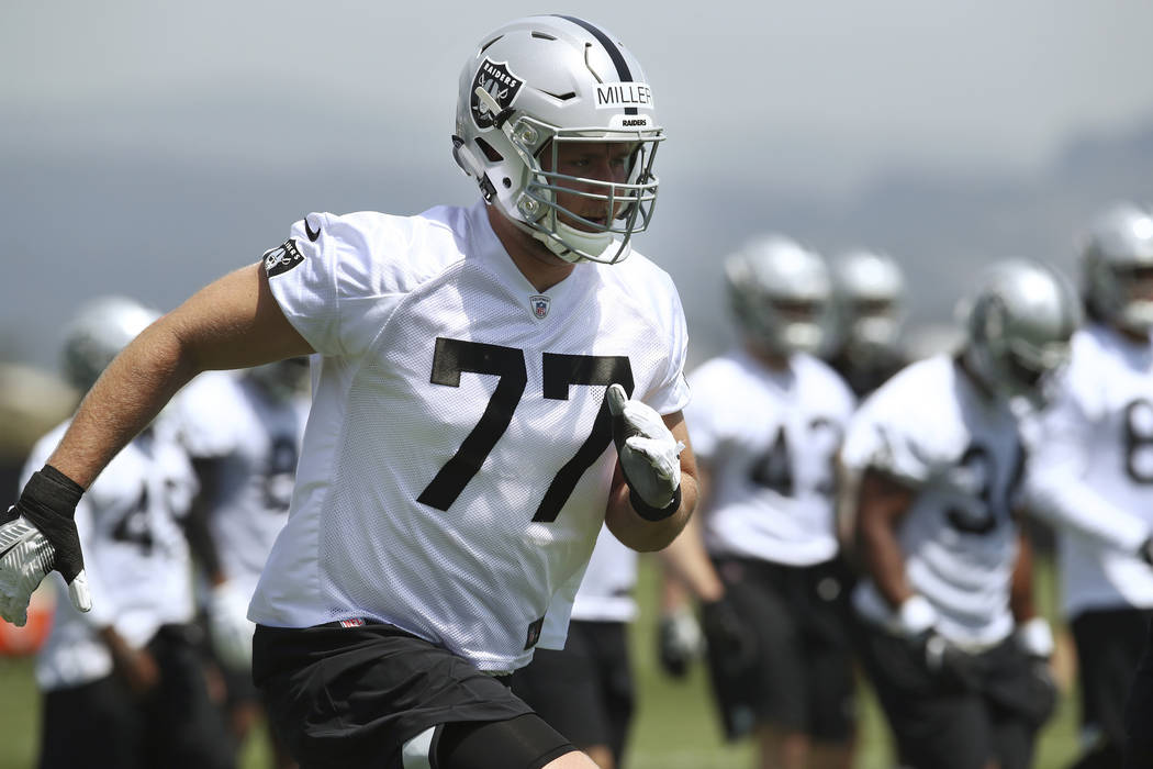 Oakland Raiders' Kolton Miller (77) runs during an NFL football practice on Friday, May 4, 2018 ...