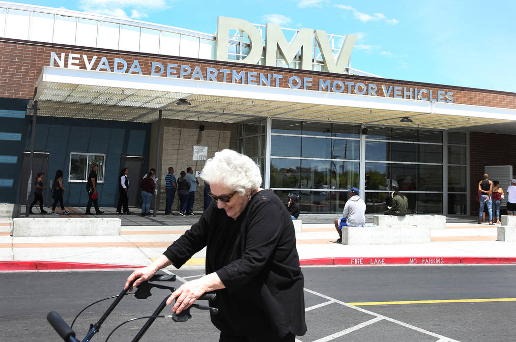 A customer walks past the DMV at East Sahara office on Friday, May 10, 2019, in Las Vegas. (Biz ...