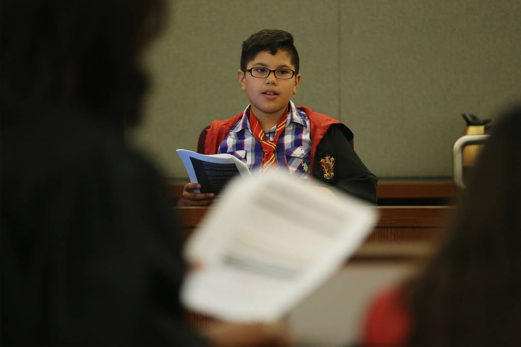 Alejandro Mata, 10, in character as Harry Potter, takes the winters stand during a mock trial a ...