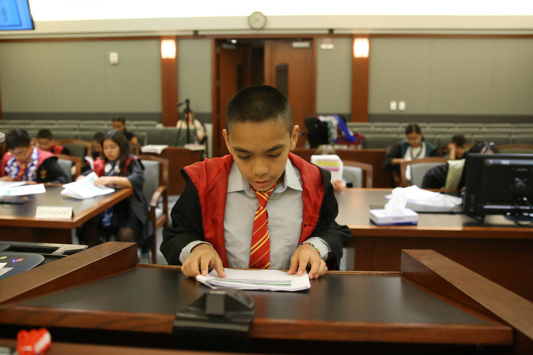 Playing as an attorney Jaivian Gonzalez, 10, speaks during a mock trial at the Regional Justice ...