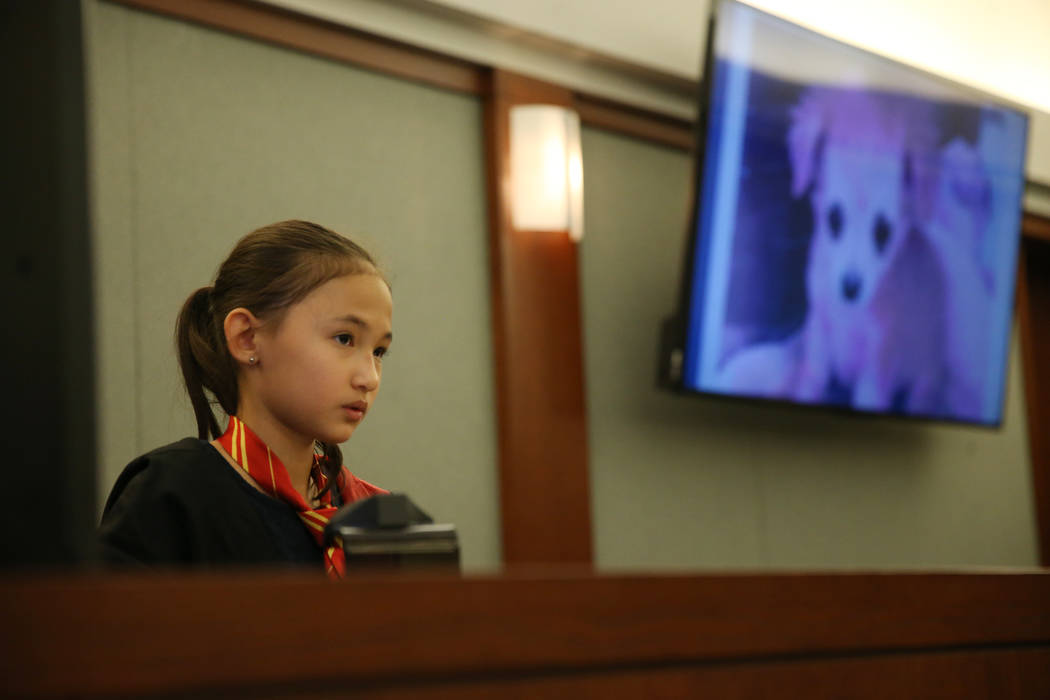 Selina Leipard, 10, in character as Hermione, takes the witness stand during a mock trial at th ...
