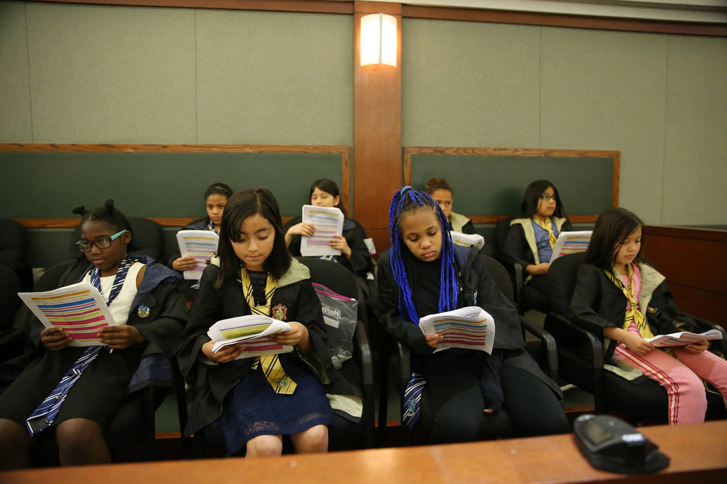 Fourth grade students from Hickey Elementary School participate in a mock trial at the Regional ...