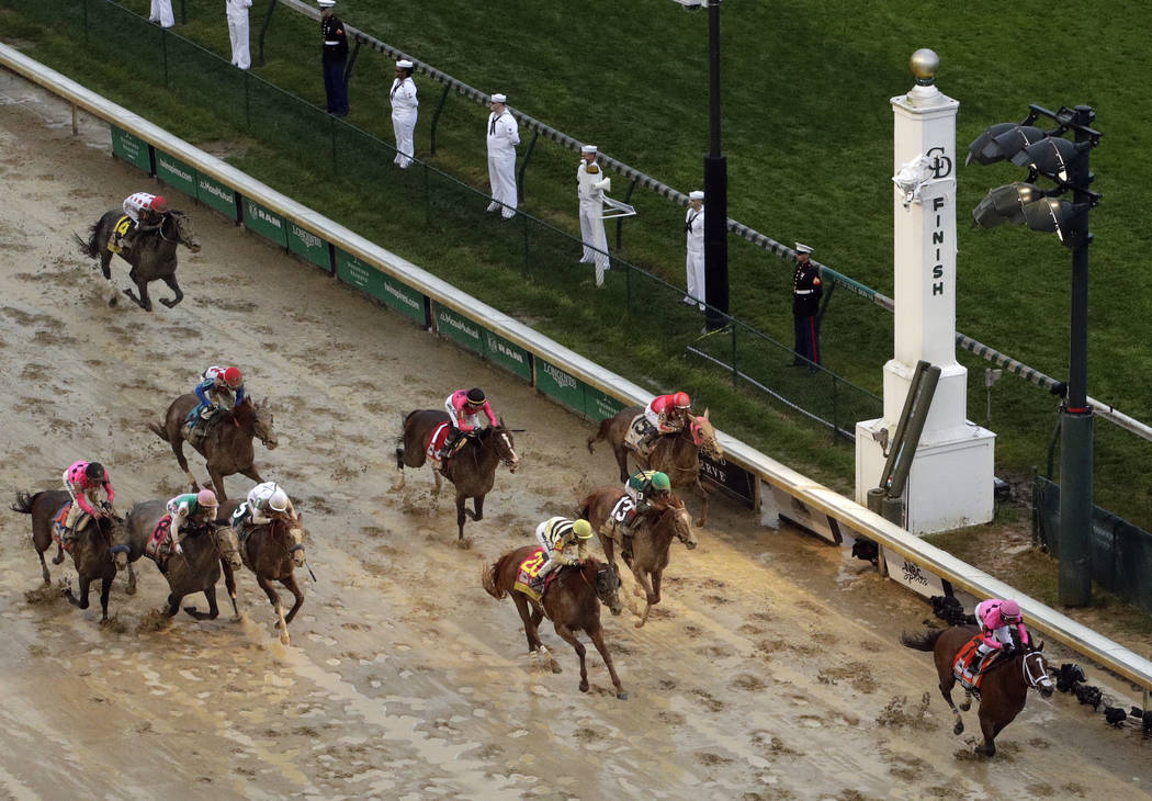 Luis Saez rides Maximum Security to the finish line first against Flavien Prat on Country House ...