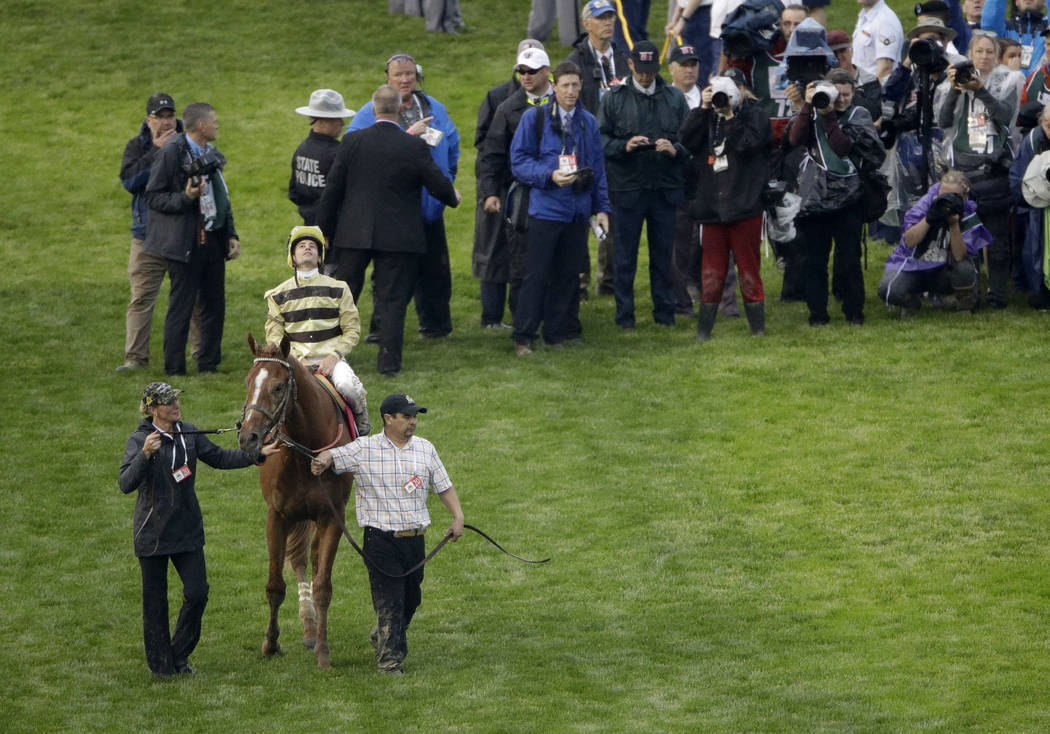 Flavien Prat on Country House reacts after the 145th running of the Kentucky Derby horse race a ...