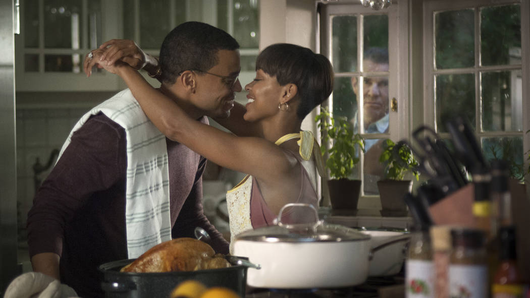 This image released by Sony Pictures shows Michael Ealy, from left, Meagan Good and Dennis Quai ...