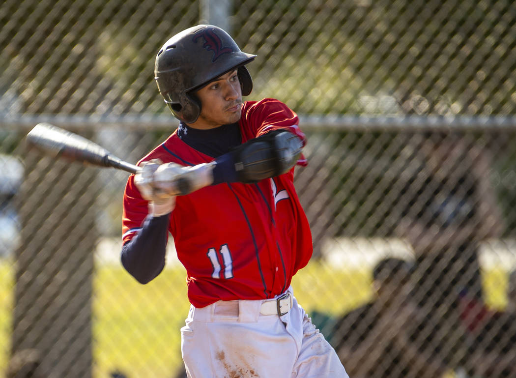 Liberty's James Katona (11) eyes a pitch versus Spring Valley during the first round of the Des ...