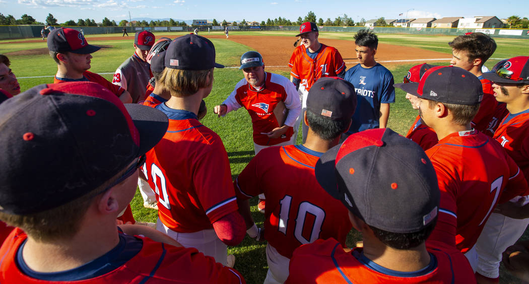 Liberty head coach Rich Ebarb motivates his players late in the game during a time out versus S ...