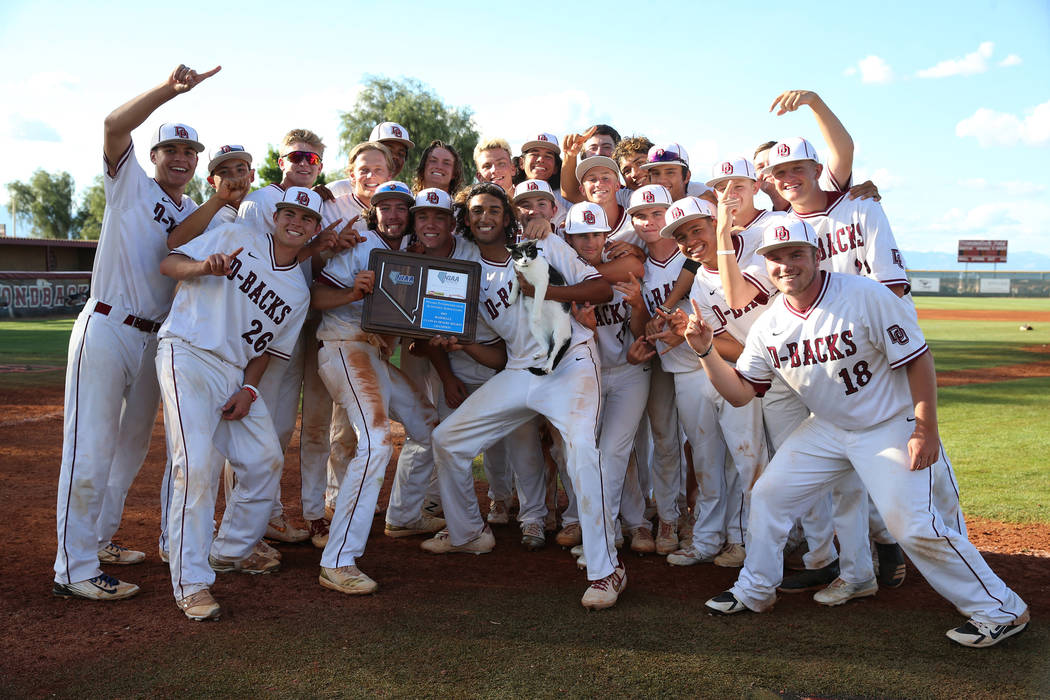 Desert Oasis pose for a photo after their win against Basic in the Desert Region championship b ...