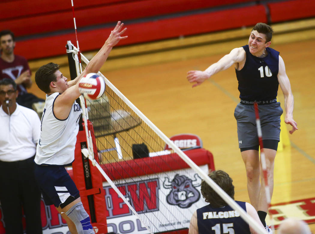 Foothill's Caleb Stearman (10) spikes the ball past Coronado's Jacob Ceci (7) during the Desert ...