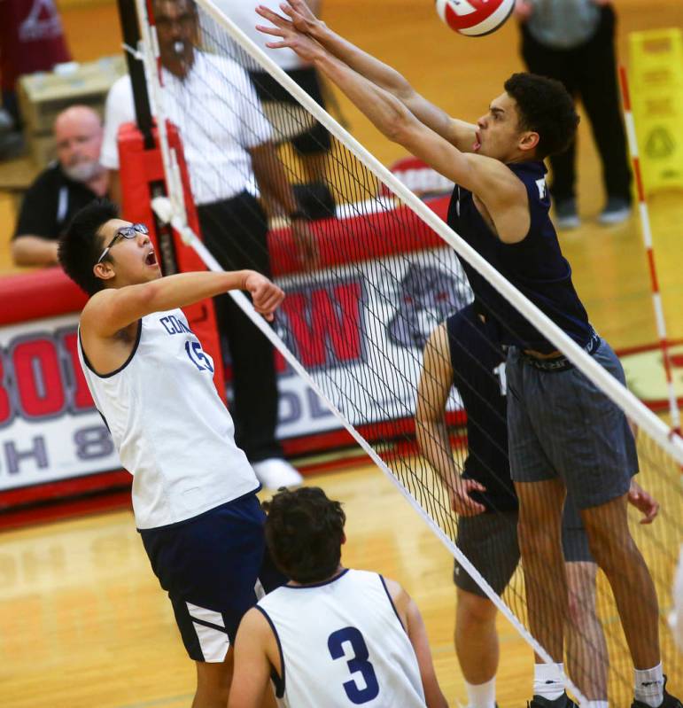 Coronado's Justin Fan (15) gets the ball past Foothill's Jace Roquemore (3) during the Desert R ...