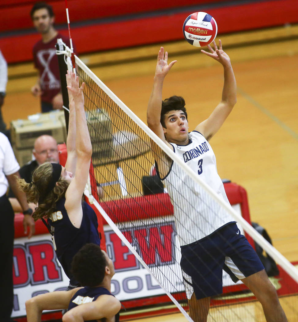 Coronado's Alex White (3) sets the ball for a teammate during the Desert Region tournament cham ...