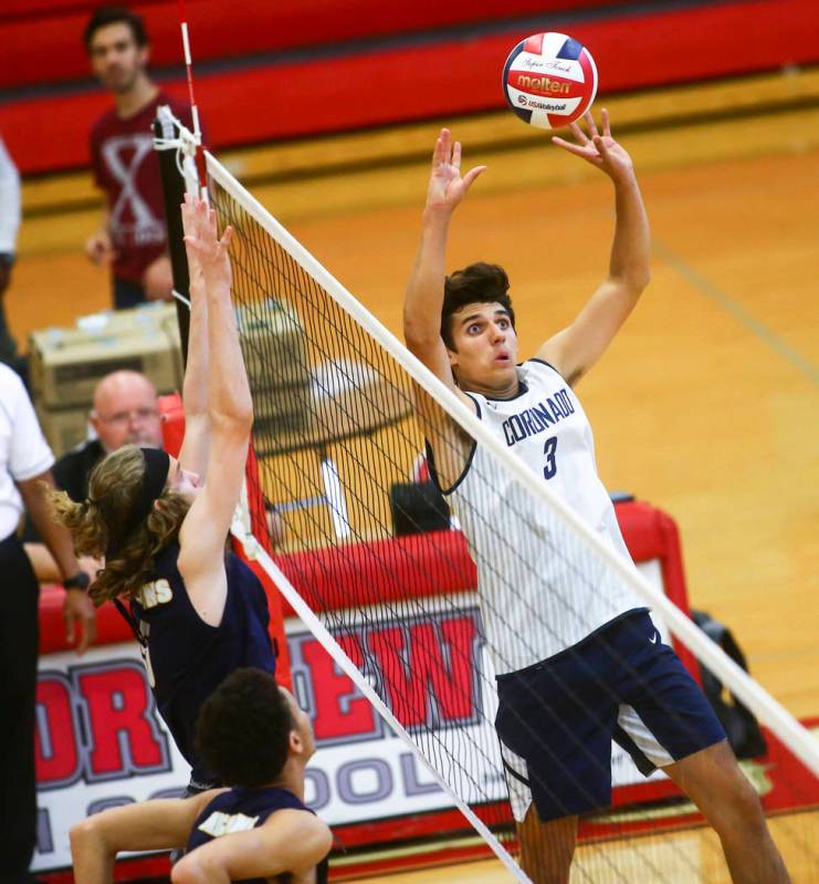 Coronado's Alex White (3) sets the ball for a teammate during the Desert Region tournament cham ...