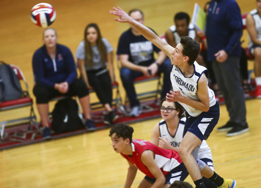 Coronado's outside hitter Alex Winiarczyk (9) sends the ball to Foothill during the Desert Regi ...