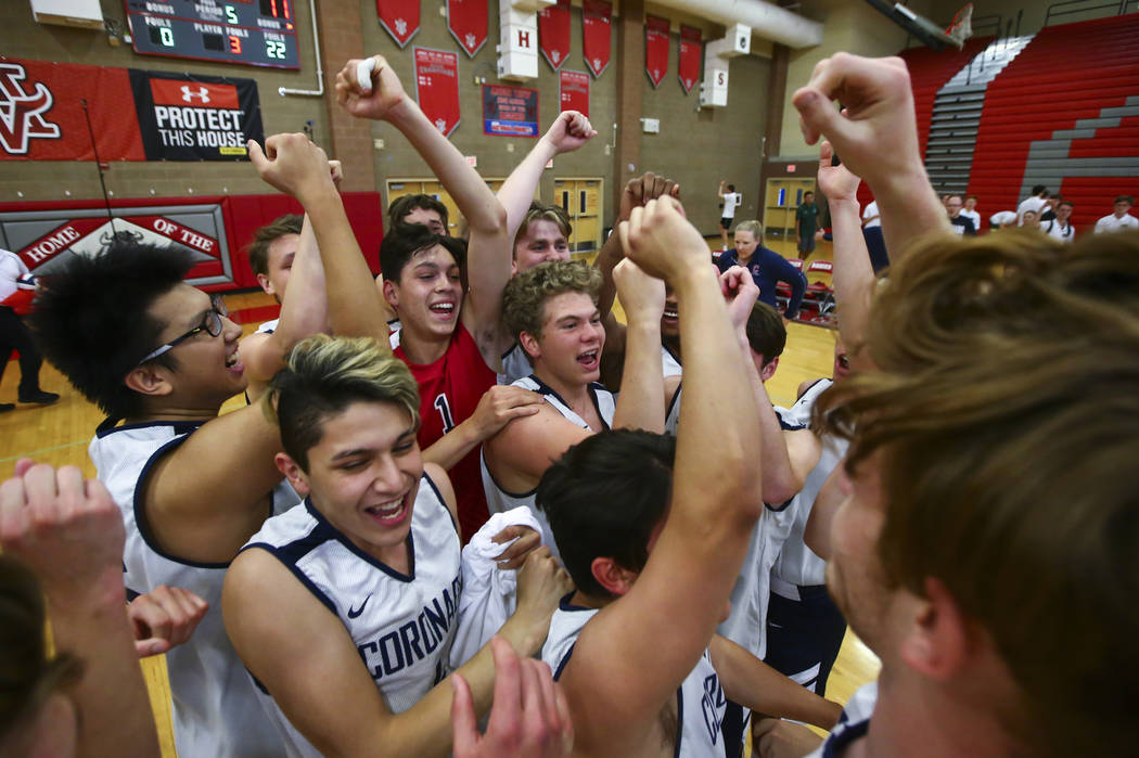 Coronado players celebrate their victory over Foothill in the Desert Region tournament champion ...