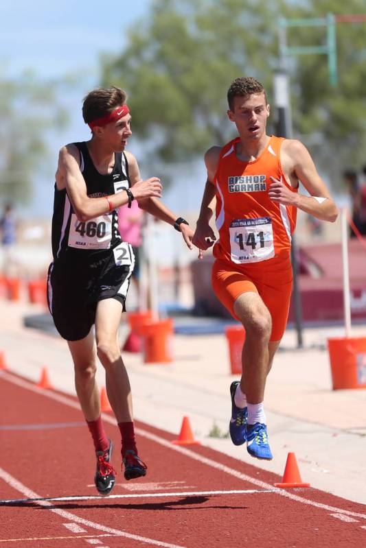 Desert Oasis Conner Nicholas (460), center, wins the Desert Region boys 3200 meter run, followe ...